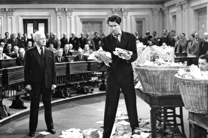 Senador norte-americano discursa por mais de 25 horas contra Trump e bate recorde mundial 2 claude-rains-e-jimmy-stewart-em-a-mulher-faz-o-homem-de-frank-capra-foto-reproducao-tvt-news